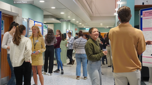 MPhil students presenting at their poster session