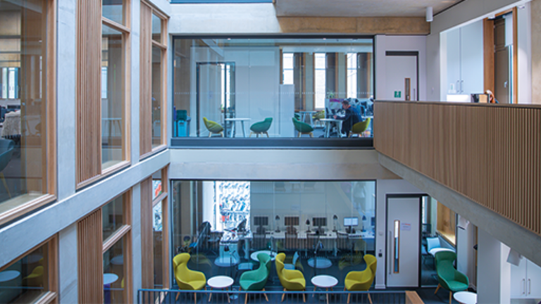 rooms with chairs and desks in the Students Services Centre